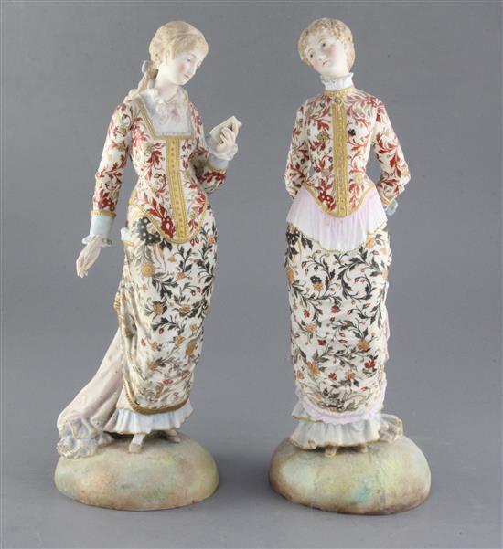 Two French painted biscuit porcelain figures of elegant ladies, late 19th century, height 35.5cm and 36cm